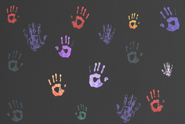 A wall with palm handprints creative art design symbol of human personality