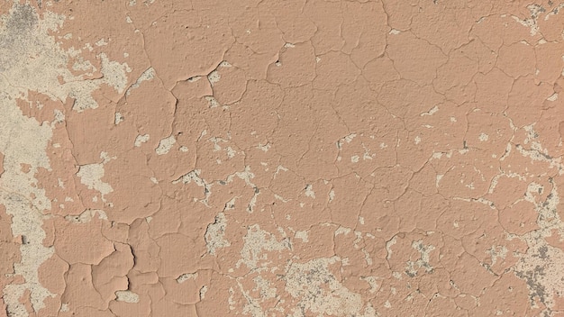 A wall with a rough textured surface and a pink paint that says'grout'on it