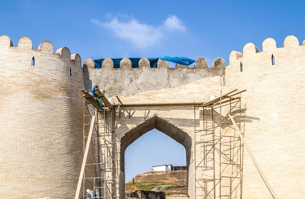 The walls of the fortress are decorated with travertine Reconstruction of the ancient city of Shymkent in Kazakhstan