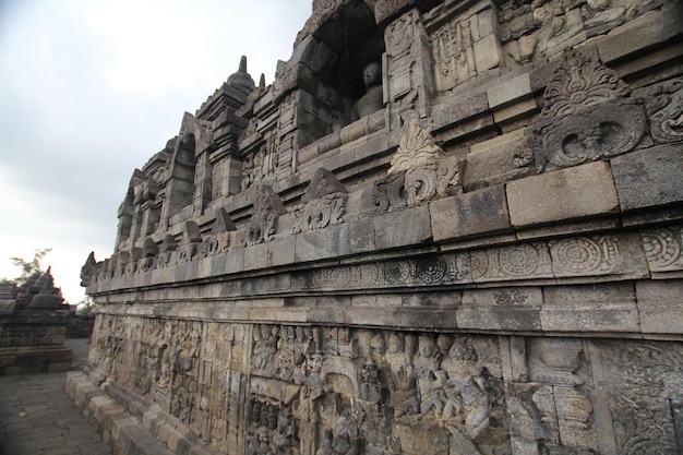 The walls of the temple are made of stone.