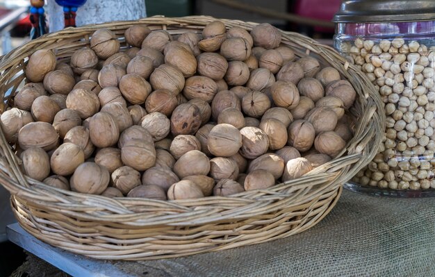 Walnuts in a large wicker basket at a bazaar in Turkey.