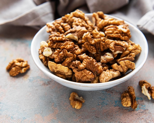 Walnuts  without shell on a concrete background