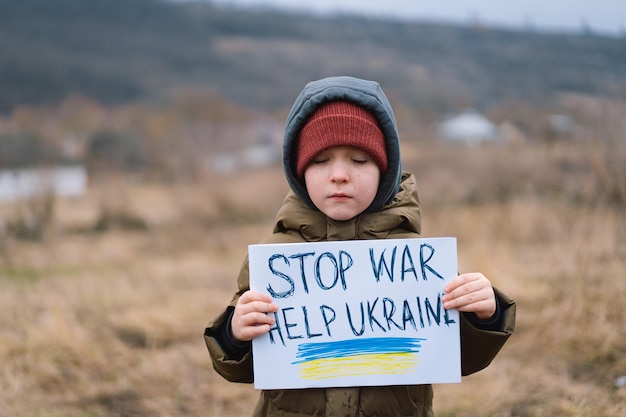 War of Russia against Ukraine Crying boy asks to stop the war in Ukraine