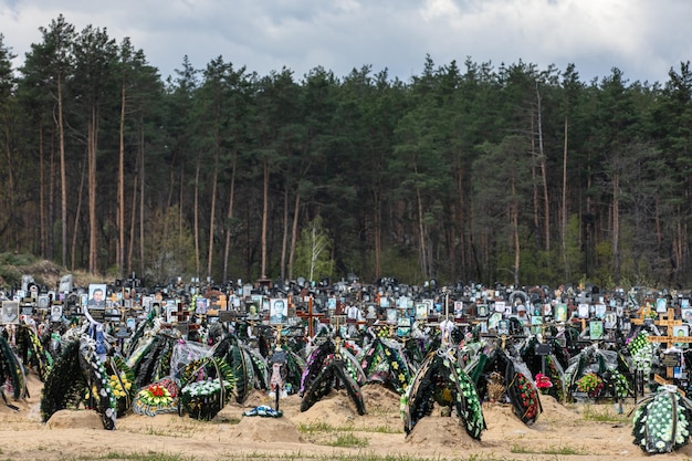 War in Ukraine Cemetery in Irpen with fresh graves