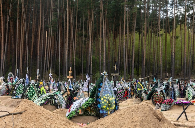 War in Ukraine Cemetery in Irpen with fresh graves