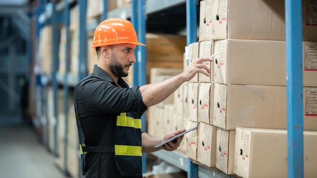 Warehouse worker working in warehouse stock checking inventory production stock control Warehouse control and management business factory industry logistics warehouse people