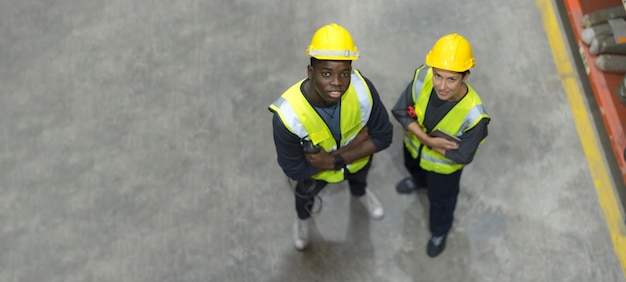 Warehouse workers and managers check stock