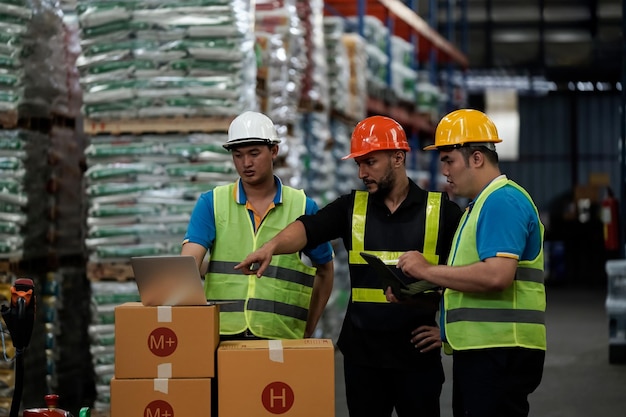 Warehouse workers selling stock checks with tabletsbusiness idea