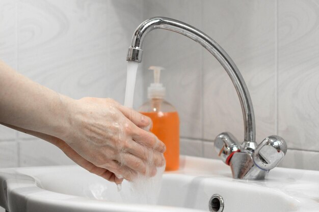 Wash hands with soap and hot water