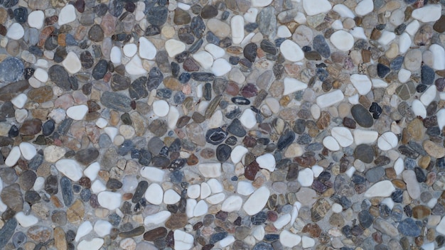 Washed gravel stone old rough rustic pattern texture background wallpaper