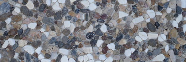 Washed gravel stone old rough rustic pattern texture background wallpaper