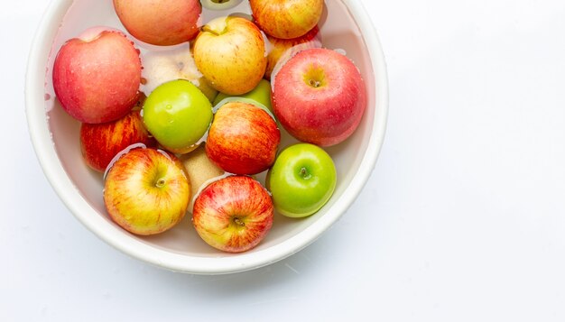 Washing fresh apples in the water