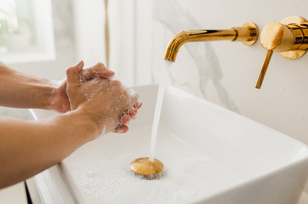 Washing hands and rubbing with soap