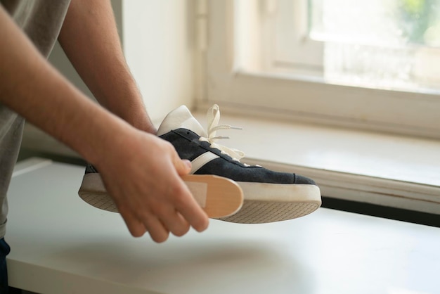 Washing sneakers with special brush tool dirty shoes cleaning