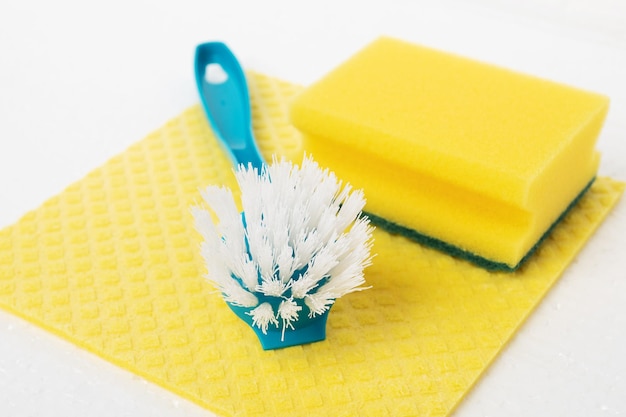 Washing windows facades mirrors Sponges rags brushes on a white background