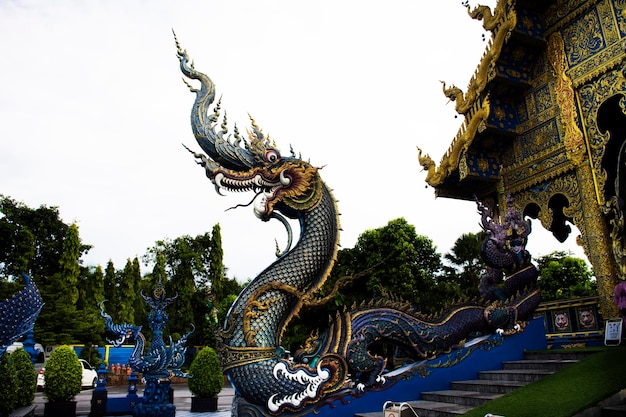 Wat Rong Seur Ten or artistic blue temple for thai people foreign travelers travel visit and respect praying blessing with holy mystery worship at Chiangrai city on July 1 2022 in Chiang Rai Thailand