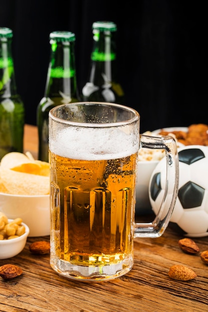 Watch football live prepare beer and snacks