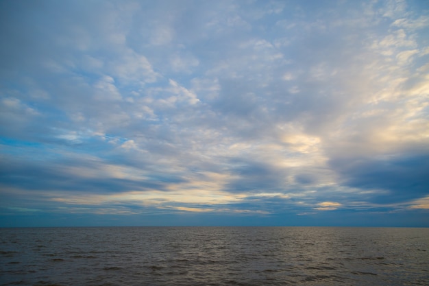 water and blue sky before sunset background