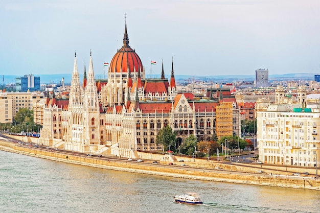 Water boat at Danube River with Hungarian Parliament Building, Hungary