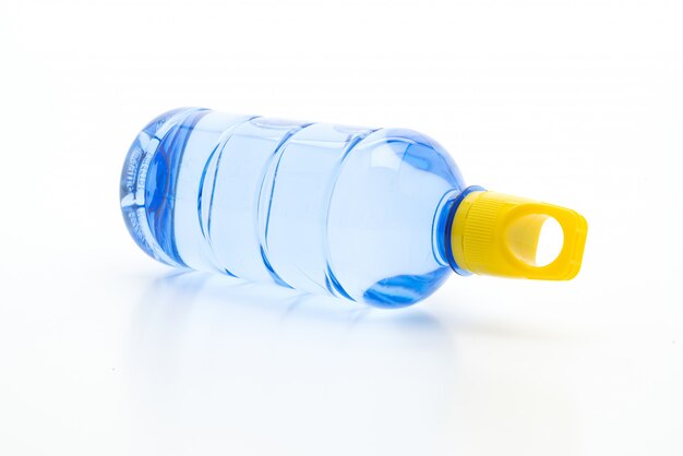 water bottle on white wall