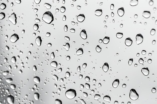 Water droplets on glass surface seamless texture background isolated white color