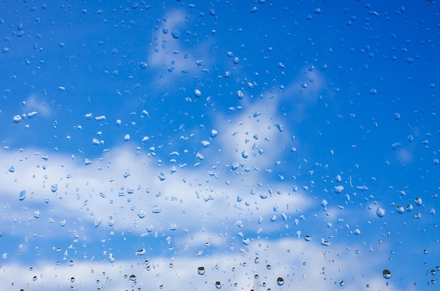 Water drops after rain on window glass surface.