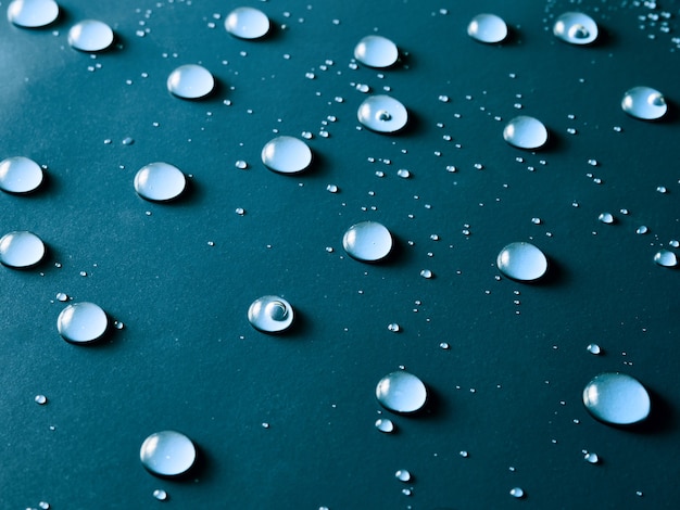 Water drops on blue background.