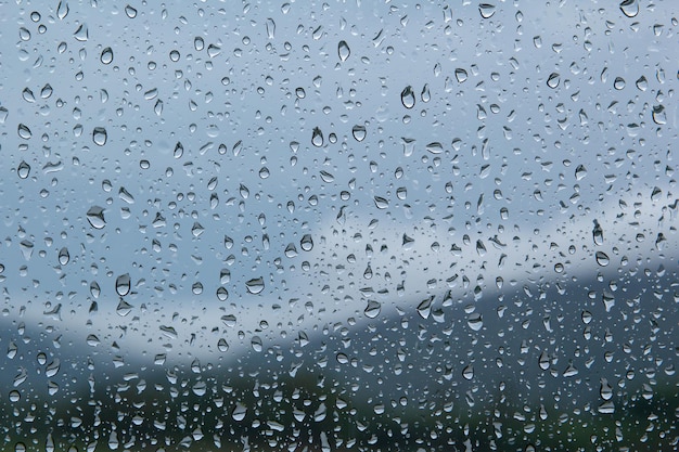 Water drops on car glassrain drops on clear window