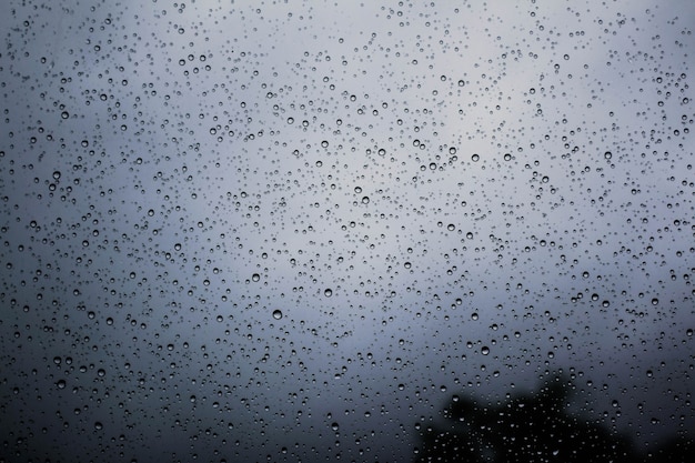 Water drops on glass of falling rain.