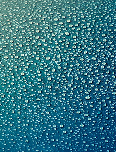 Water drops on turquoise.