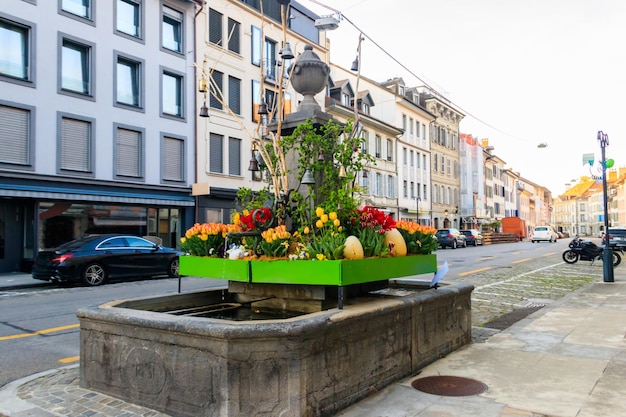 Water fountain decorated for Easter in Morges Switzerland