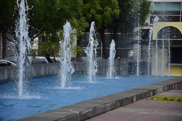 Water fountains in a public space near an area of the pier boardwalk in Guayaquil