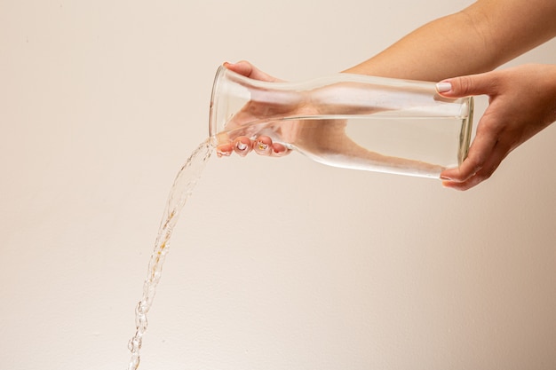 Water Pour into Glass. Water pouring. Splashing water