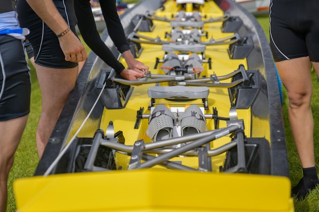 Water rowing boots in the yellow boat