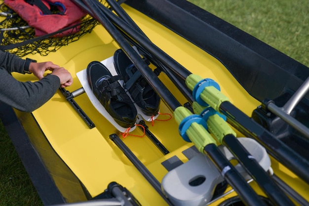 Water rowing boots in the yellow boat