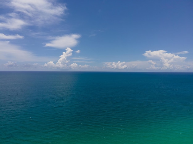 Water sea blue sky and clouds