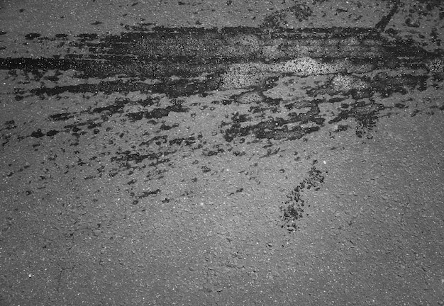 Water splash on asphalt road background