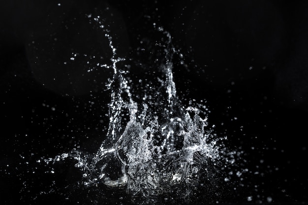 Water splash on black, fresh feeling 