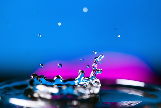 Water splash on creative background