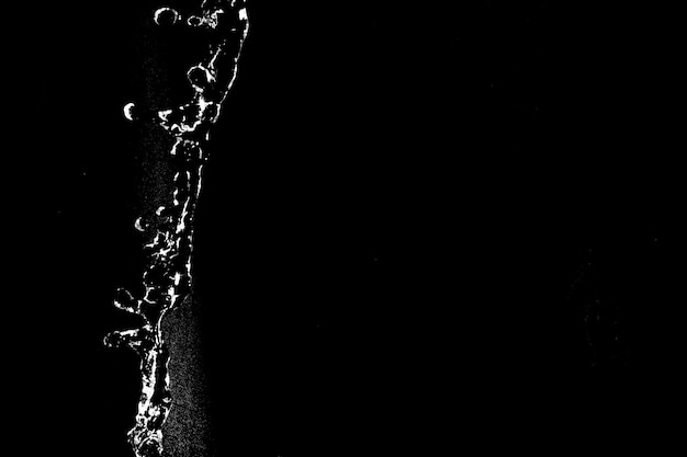 Water splashes isolated on black background white jets with drops