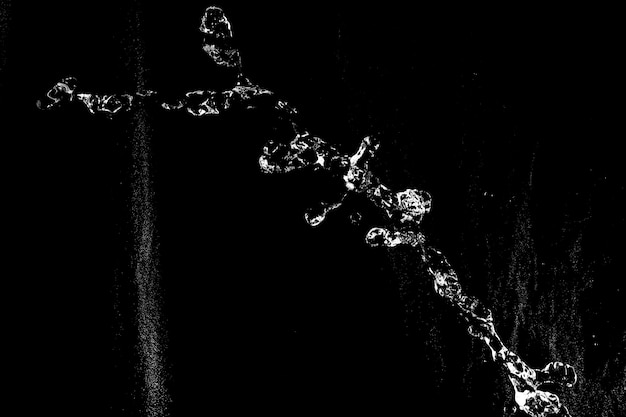 Water splashes isolated on black background white jets with drops