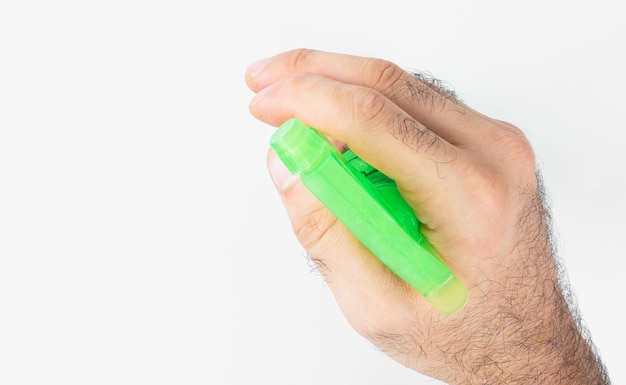 Water sprayer in hands on a white background