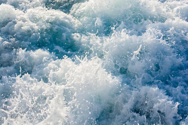 Water surface background with foam and bubbles