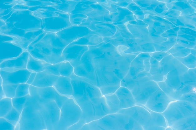 water in swimming pool rippled water detail background