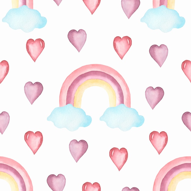 Watercolor nursery  seamless pattern with hand painted rainbows .