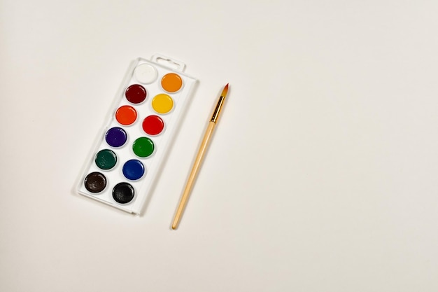 Watercolor paints and brush for drawing Children's creativity painting early development