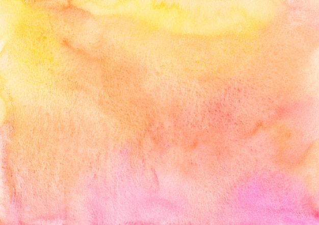 Watercolor vivid yellow, orange, pink background texture. Peach color stains on paper, hand painted.