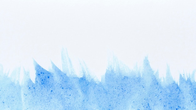 Watercolour waves of blue paint abstract background