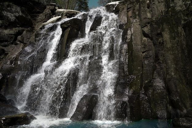 waterfall in autumn forest