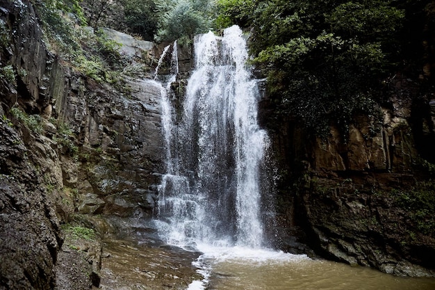 Waterfall in the Botanical garden of old Tbilisi Legvtakhevi Georgia Summer rainy day